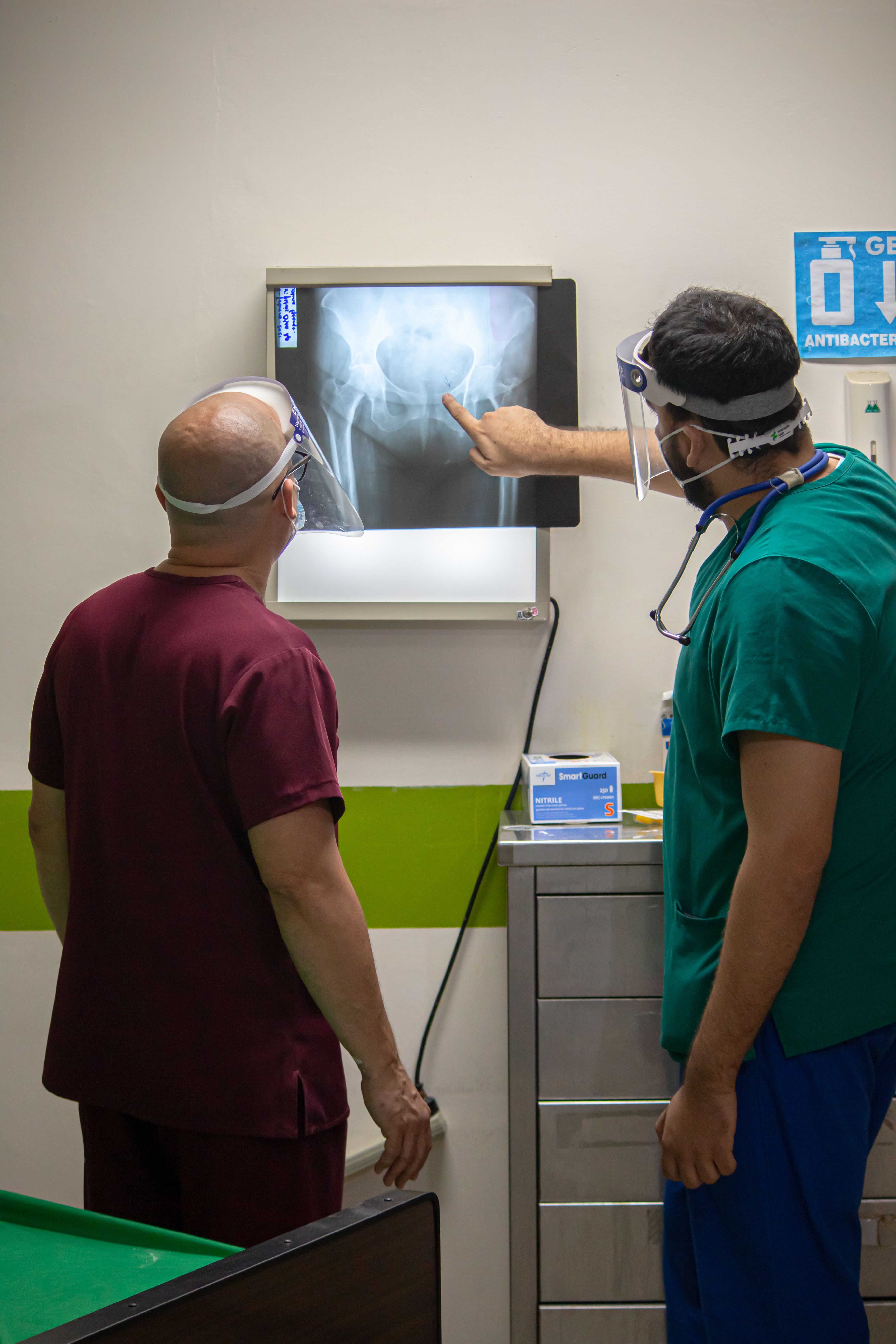 Orthopaedic surgeon reviewing a patient's x-ray